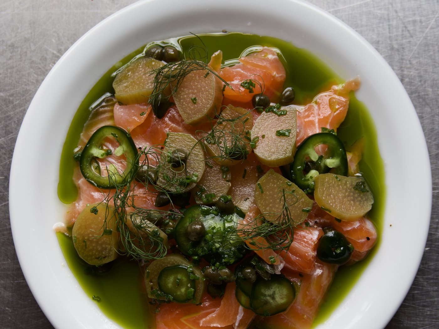 Cured salmon sharing plate with pickles, capers and dill